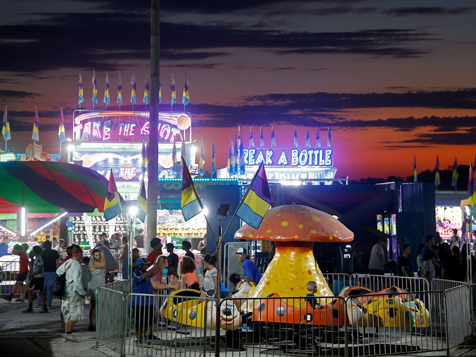 Kids play on different rides